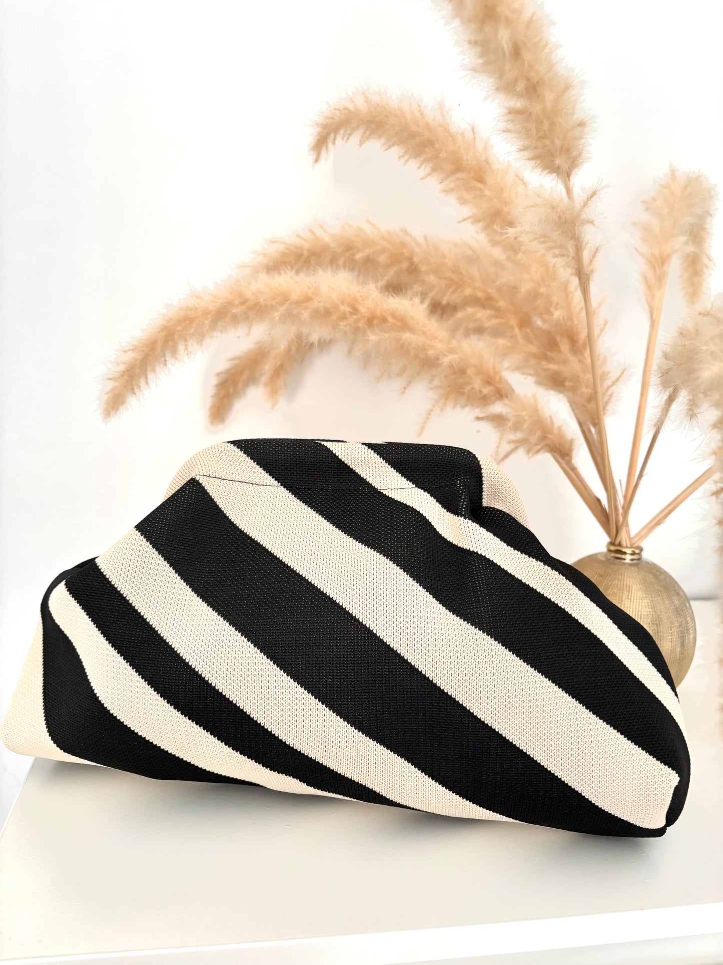 Bolso Clutch Rayas